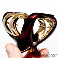Load image into Gallery viewer, Brown Octopus Shaped Plastic Hair Claw with Gold Teeth